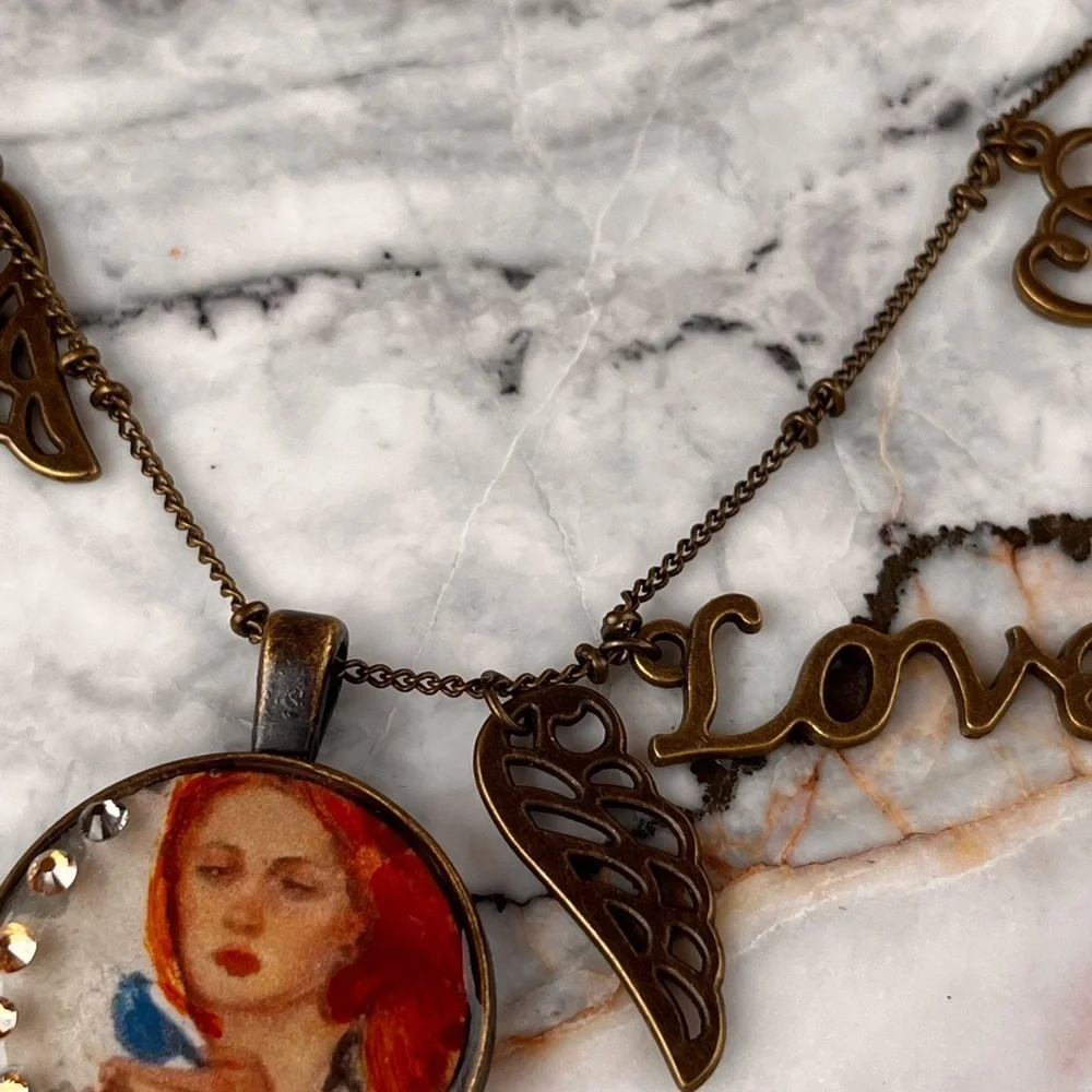 Handmade necklace with portrait and charms